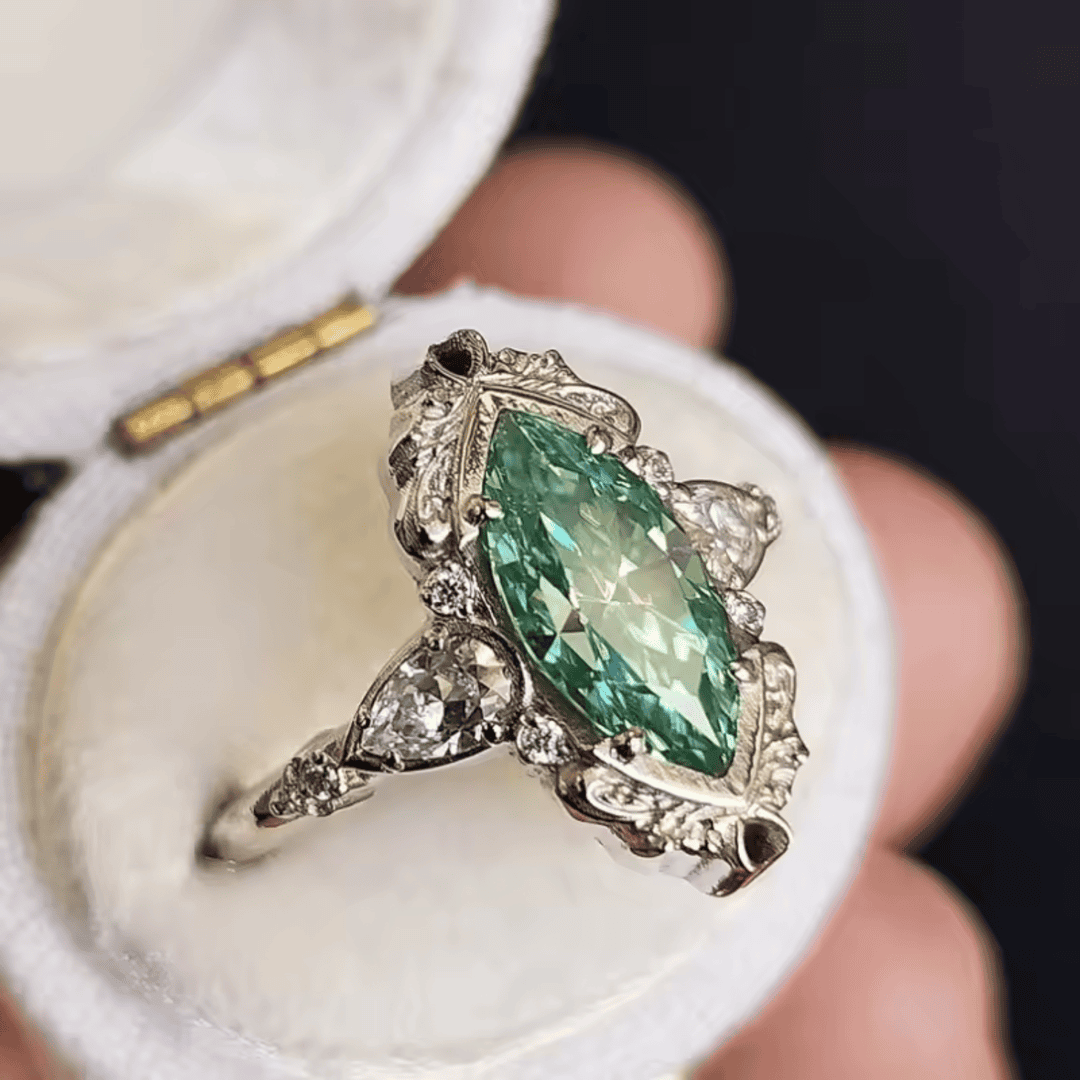 Emerald Marquise Halo Ring