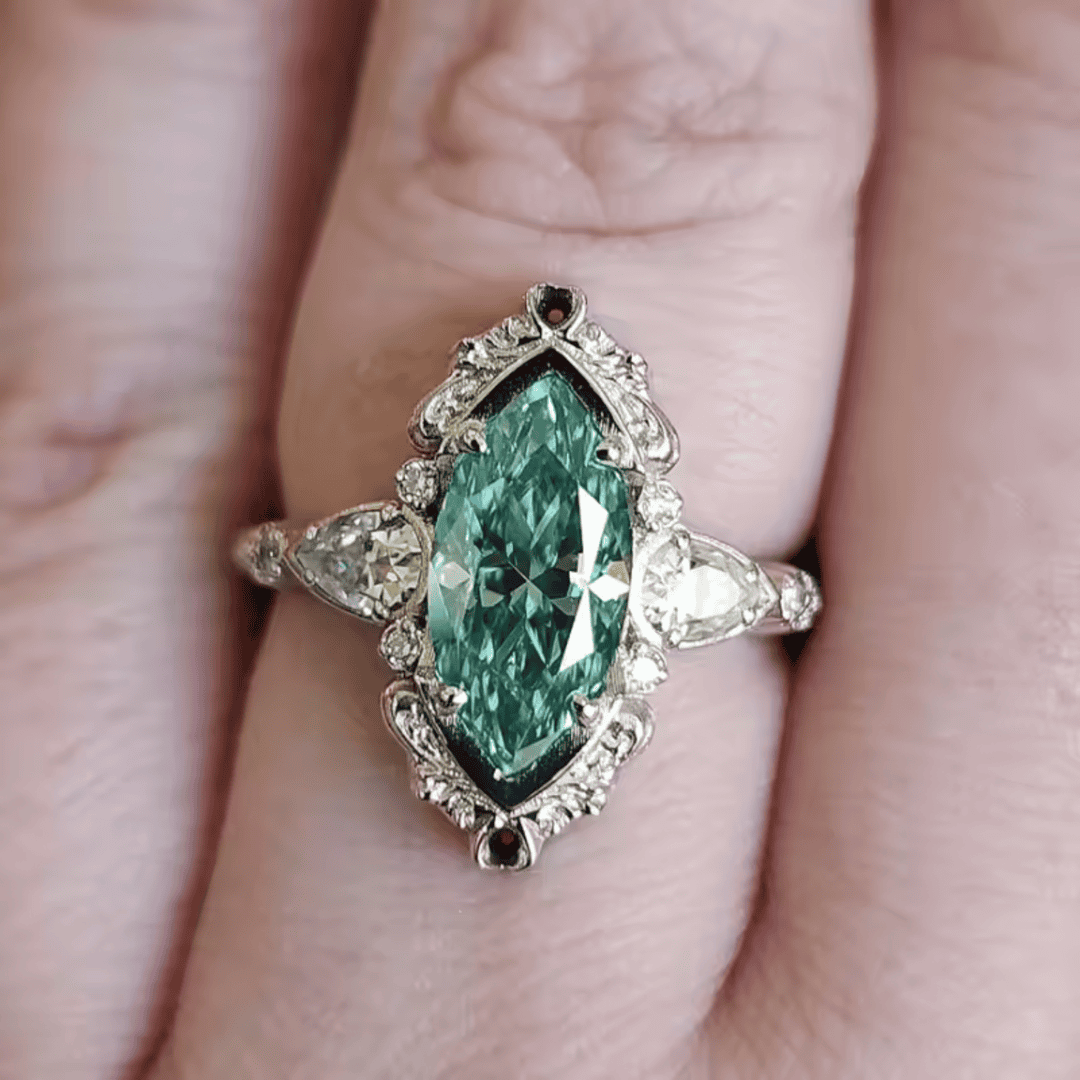Emerald Marquise Halo Ring