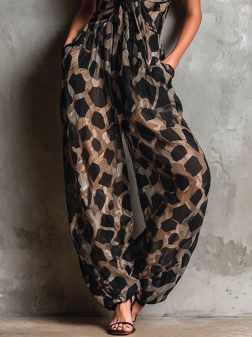 Roberta | Wide Black Chiffon Jumpsuit With Animal Print, Halter Neck and Pants