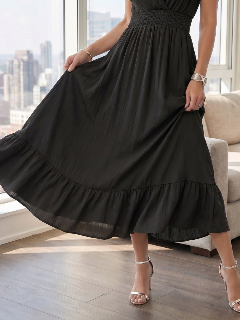 Clove | Robe mi-longue smockée à manches volantées